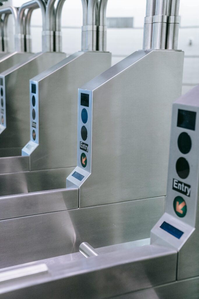 pexels-photo-8554404-8554404 Close-up of a contemporary subway turnstile in a station. Modern design and functionality.